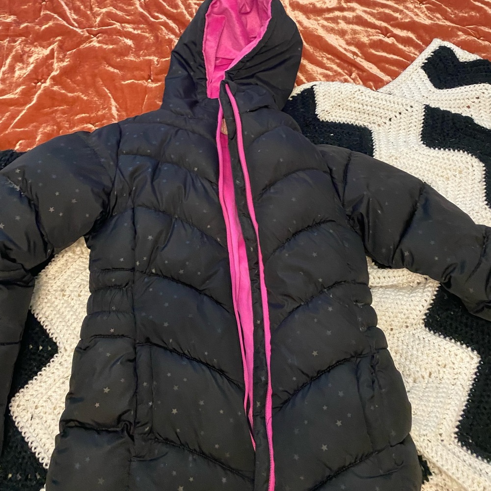 Black puffer jacket with pink interior